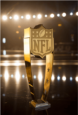 a golden trophy  with stars on it and NFL writing on it